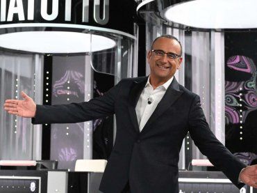 I segreti dietro la televisione, Carlo Conti e il suo passato da bancario